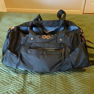 Calia by Carrie tote. Black and rose gold.